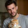 Gavin with two kittens at home